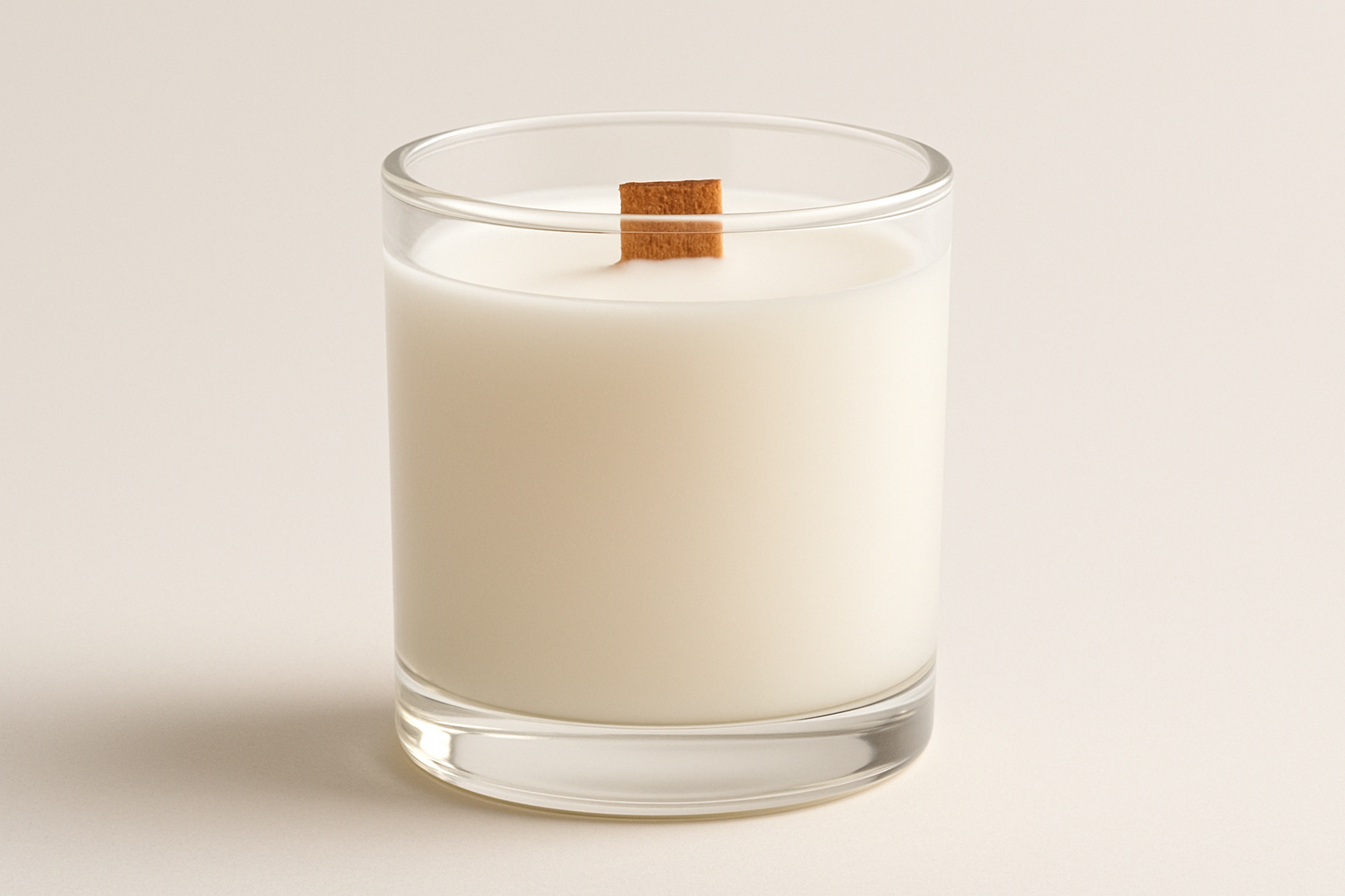 plain white candle in glass with wooden wick